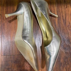 Nine West gold pumps